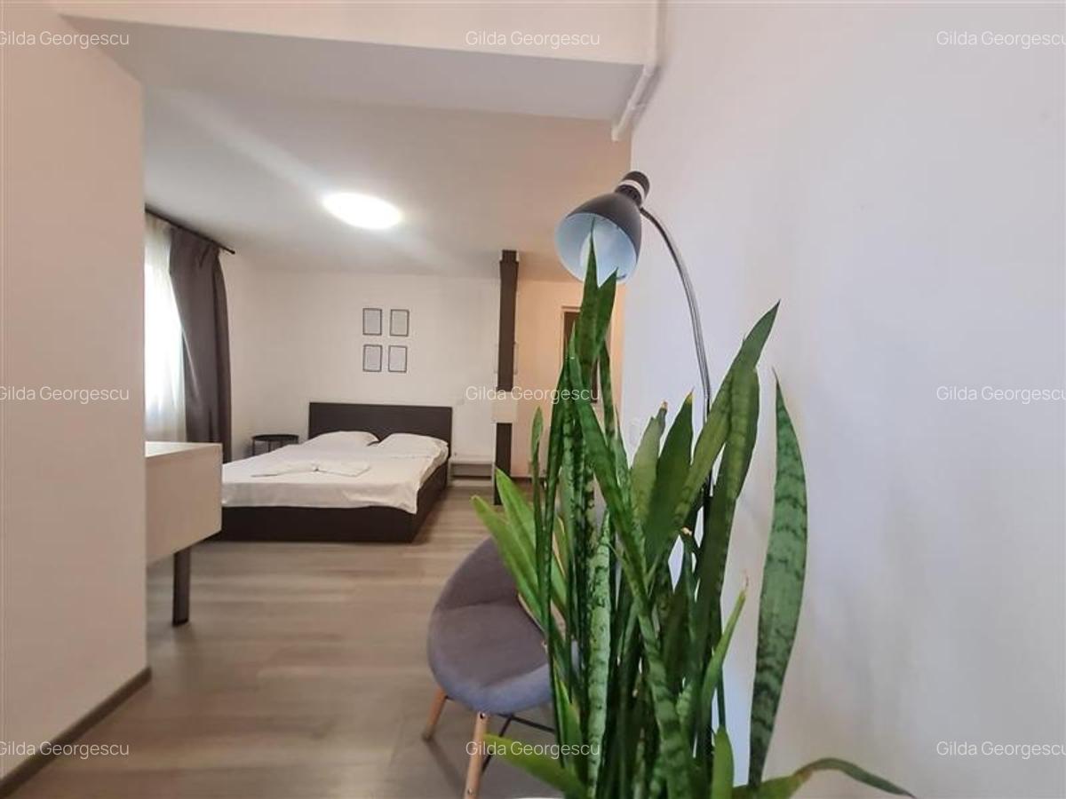 Apartament cu 2 camere decomandat, mobilat în Tractorul - 11