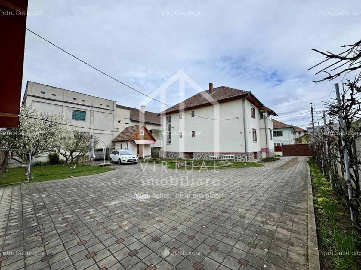 Casa individuala cu 6 camere + demisol 94mp utili, teren 972mp, garaje - 1