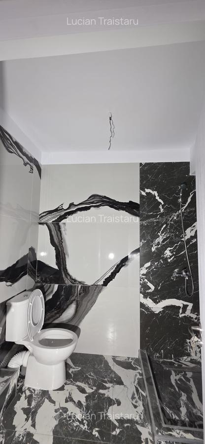 Apartament  cu balcon, demisol – construcție nouă-acces strada principala - 7