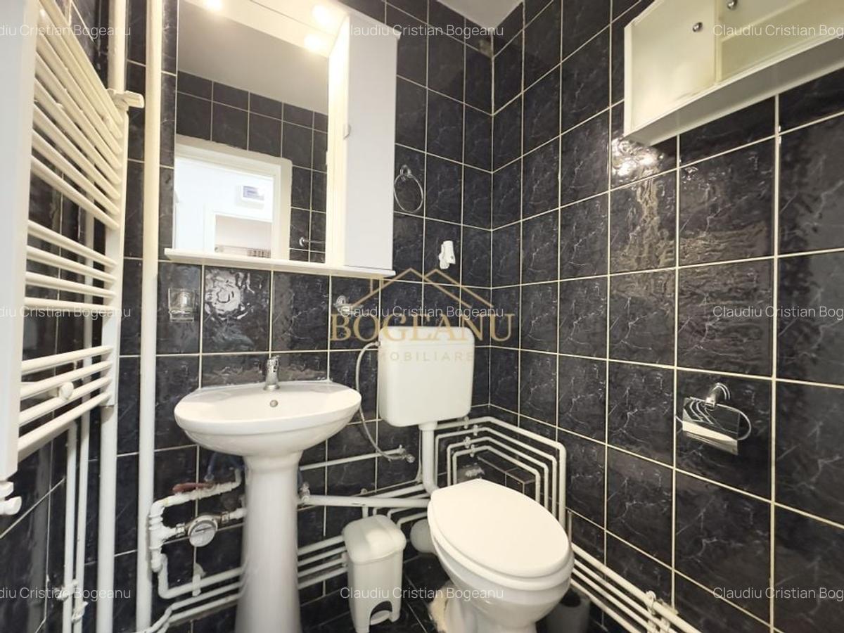 Apartament cu 3 camere semidecomandat, mobilat în Central - 13