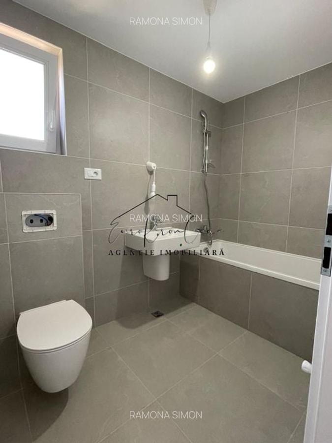 Apartament cu 3 camere decomandat în Tractorul - 14