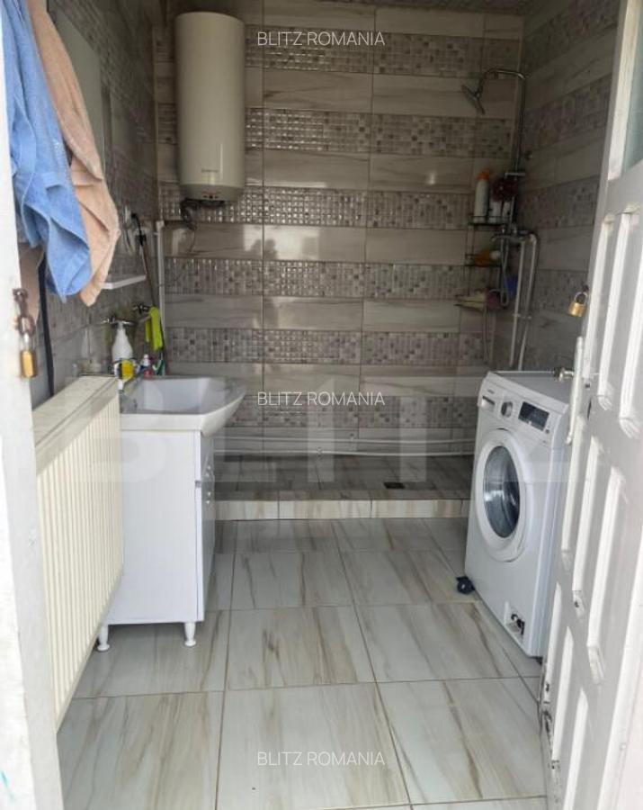 Casa pe un singur nivel , 397 mp teren, Romanesti - 10