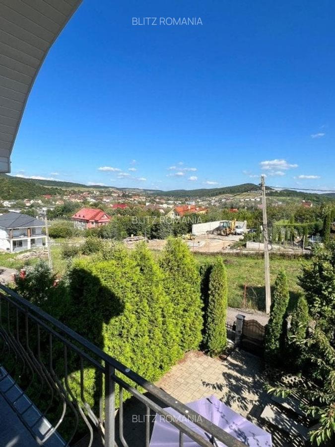 Casa cu 4 camere,198 mp utili + 350 mp teren,Corunca - 13