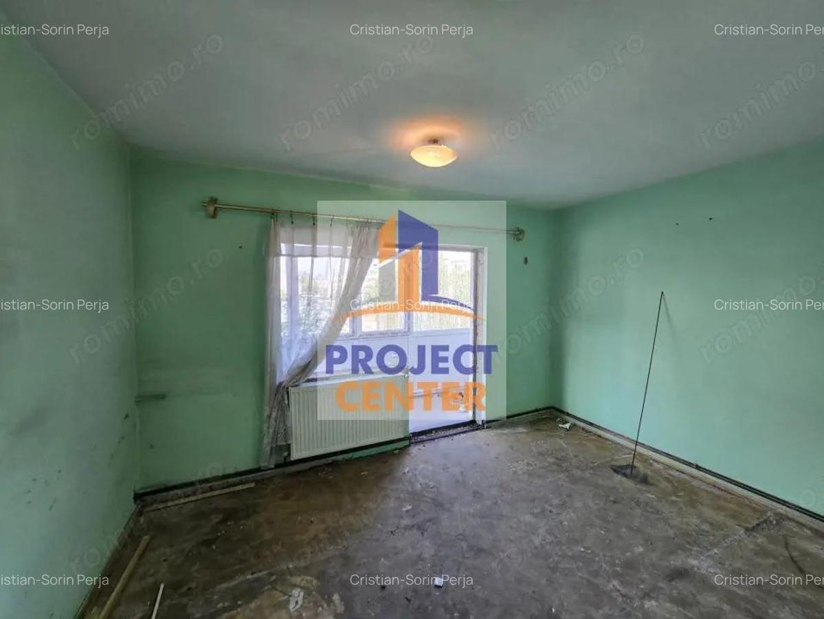Apartament 3 camere Prundu - etaj 2, decomandat - 4