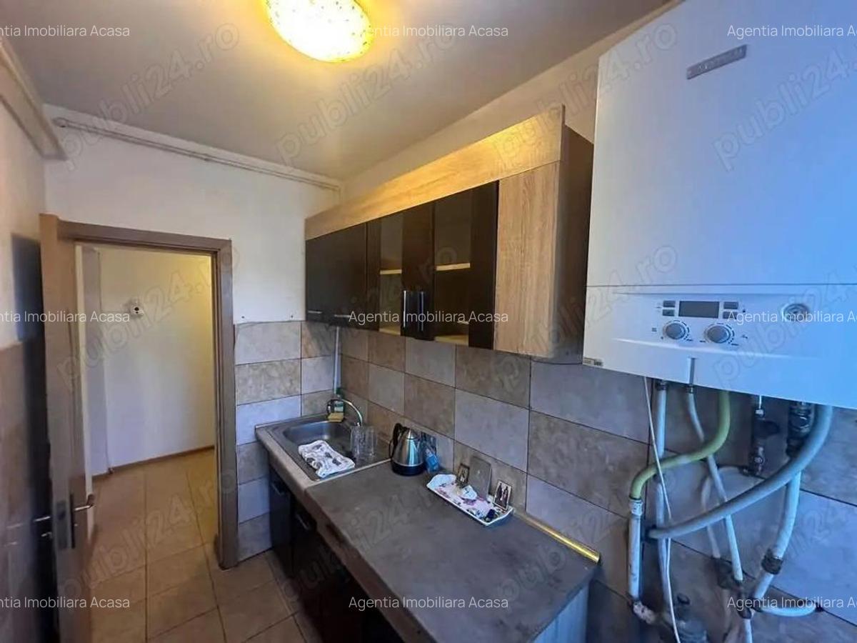 De vanzare 3 camere decomandate, etaj 2, zona linistita, 52.000 euro - 12