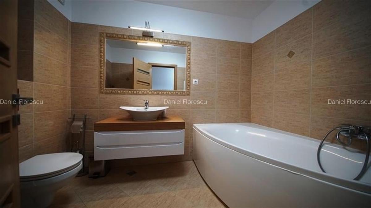 Apartament cu 4 camere decomandat în Tractorul - 7