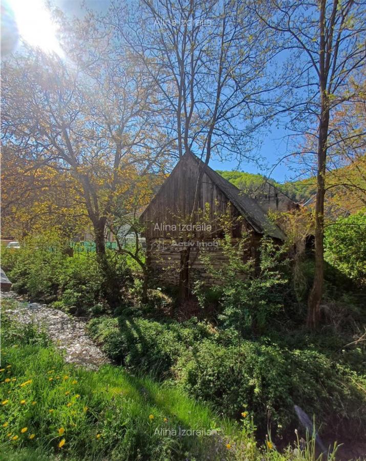 Teren intravilan cu toate utilitatile in sat de munte - 7 Teren intravilan cu toate utilitatile in sat de munte - 7