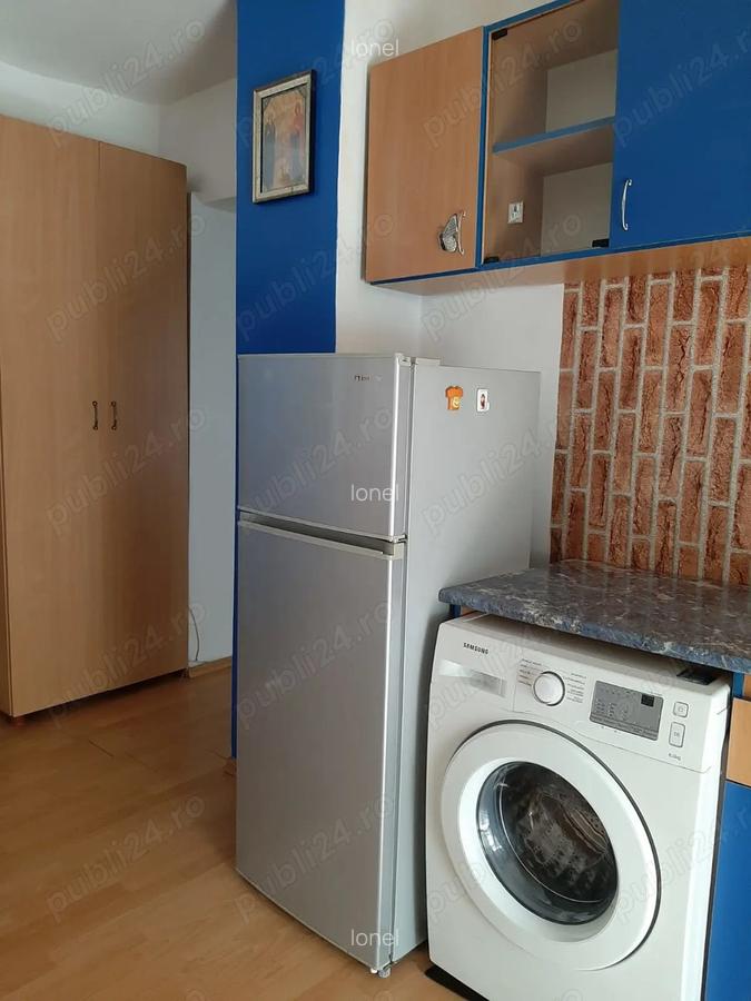 Apartament de inchiriat, peste strada de CN Spiru Haret - 5