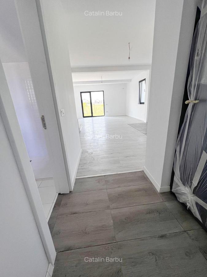 Casa tip duplex -3 dormitoare- 2 bai utilate- - 6