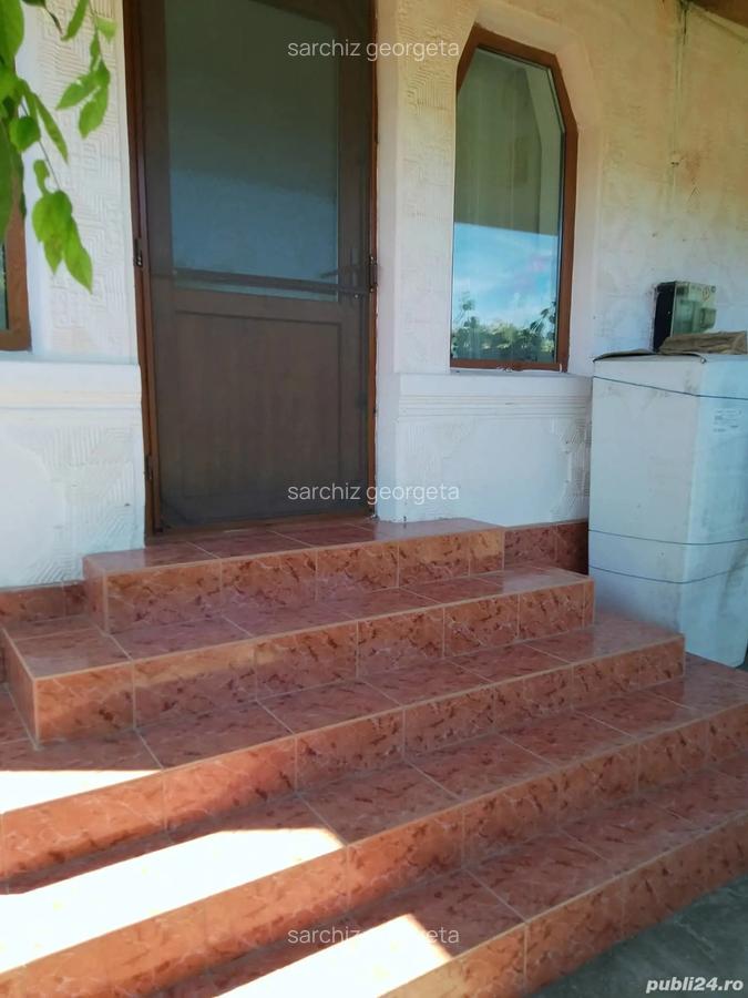 Vind casa la tara - 9