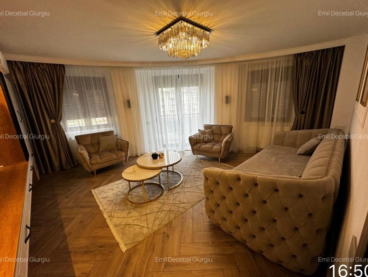 APARTAMENT DE LUX,mobilat si utilat complet,imobil monolit in inima capitalei - 2