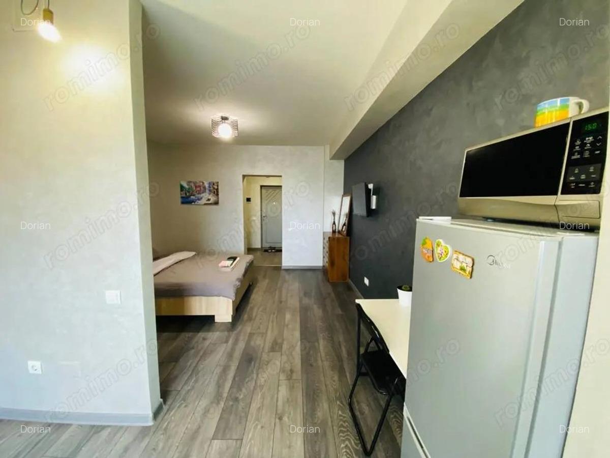 Oferim spre inchiriere o garsoniera in zona Mihai Bravu - 5