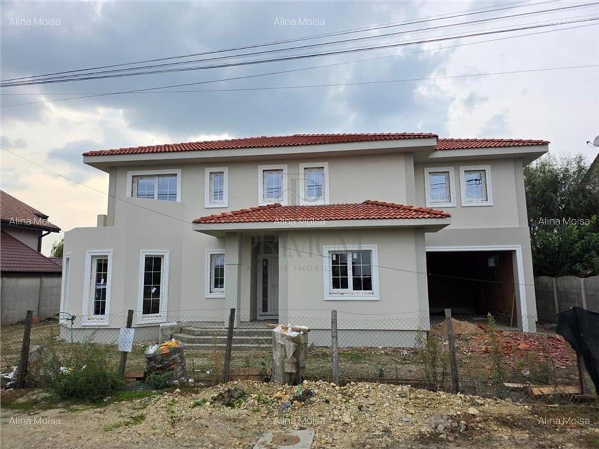 Casa individuala - teren 730 mp - garaj - 5 dormitoare - living 57 mp - 3