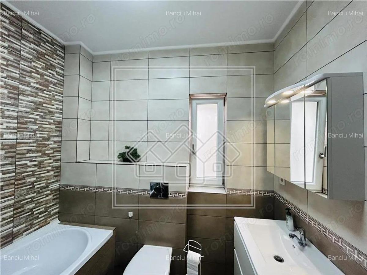 Ap spatios, cu 3 camere, 2 balcoane, etaj 1 3, loc de parcare-Selimbar - 18