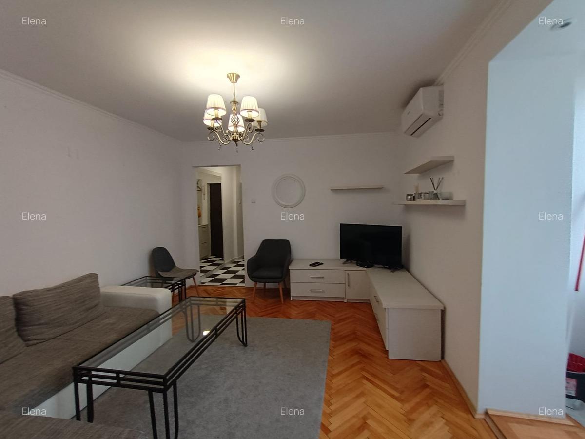 Magheru 2 camere renovat complet si mobilat - 6