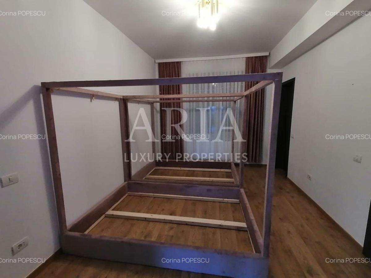 Apartament cu 5 camere decomandat, mobilat în Băneasa - 14
