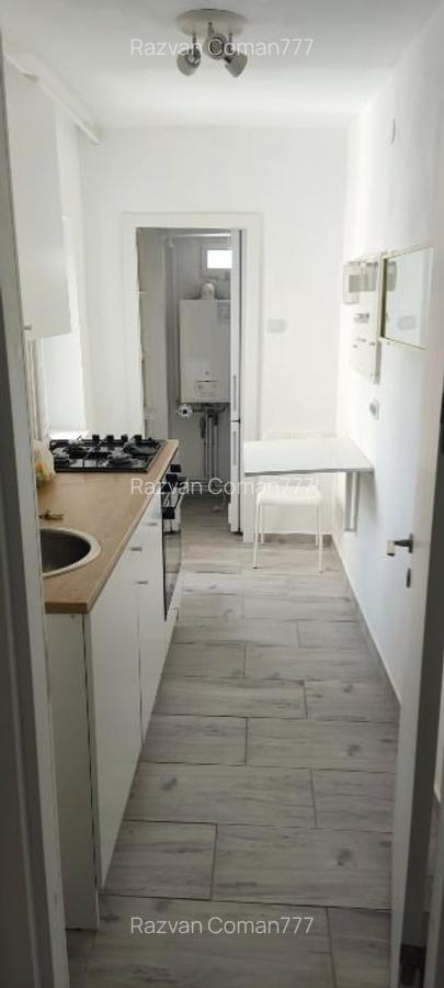 Proprietar inchiriez  garsoniera decomandata intrare Racadau - 9