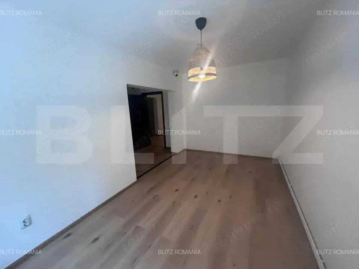 Apartament cu 2 camere, decomandat, centrala si AC, parter, cartier 1 Mai - 5