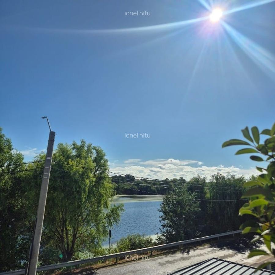 Casa 5 camere, 3 bai, 3 locuri de parcare, teren 302 mp, Tunari, vedere la lac - 13