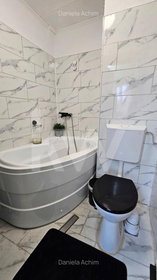 Casa individuala compusa din doua apartamente, cu teren liber de 540 mp - 6