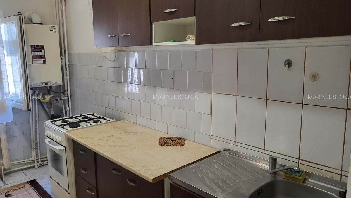 De inchiriat apartament 2 camere, situat etaj 1 in bloc mic, zona Hotel Vrancea. - 9