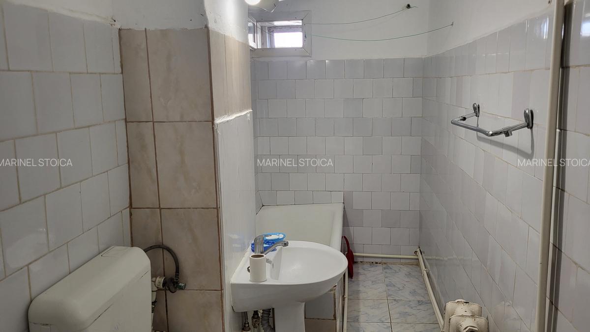 De inchiriat apartament 2 camere, situat etaj 1 in bloc mic, zona Hotel Vrancea. - 12