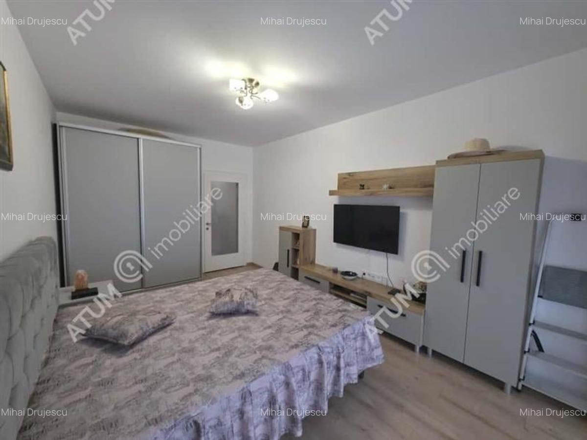 Garsoniera decomandata cu balcon si parcare in zona DaVinci din Sibiu - 4 Garsoniera decomandata cu balcon si parcare in zona DaVinci din Sibiu - 4
