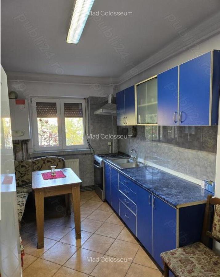 Apartament cu 3 camere,decomandat - zona Racadau - 4
