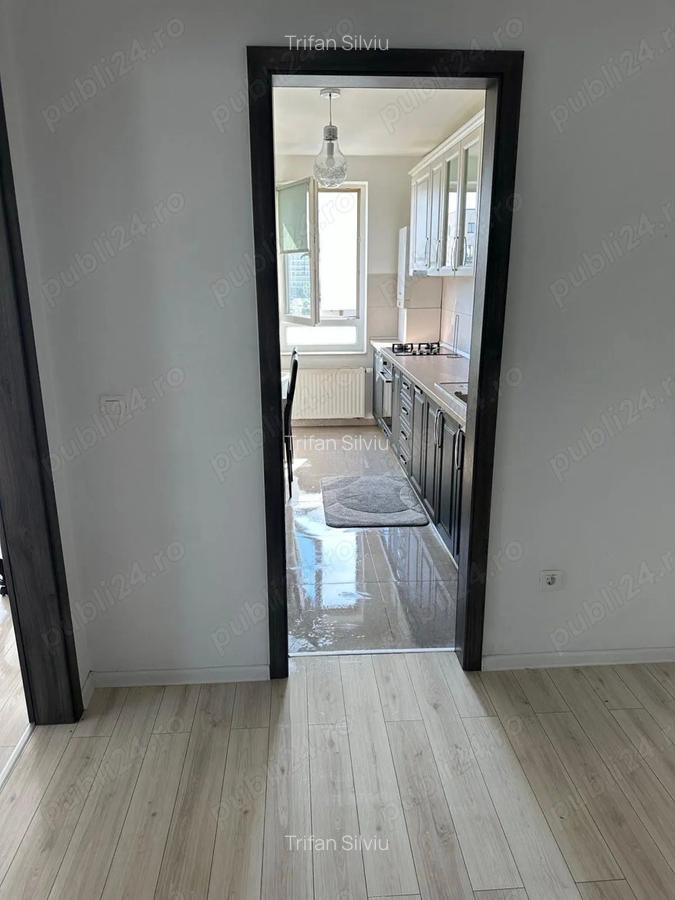 Inchiriez apartament doua camere zona Coresi. - 10