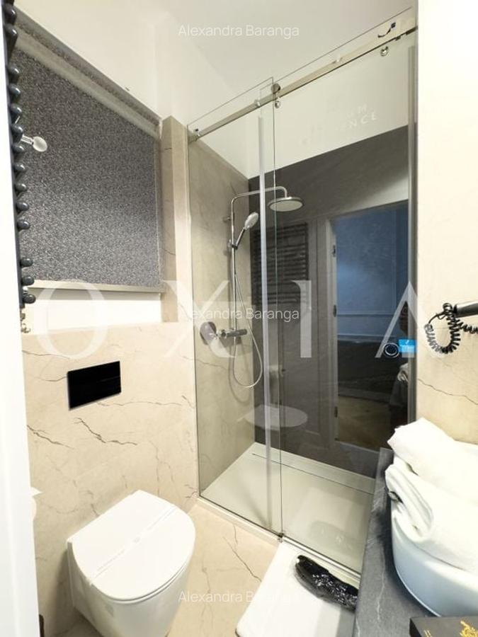 Apartament cu 3 camere circular, mobilat în P-ța Unirii - 21