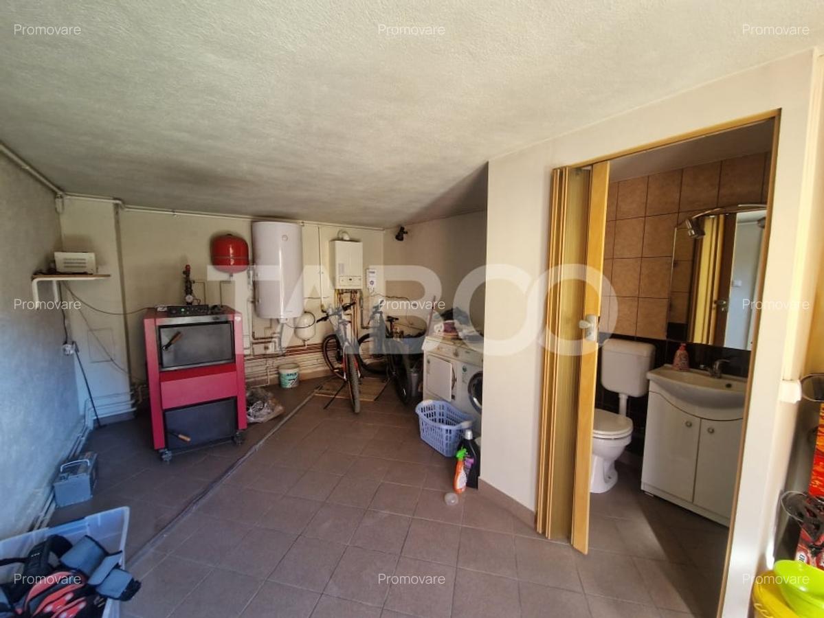 Casa individuala teren 979 mp gradina curte si terasa de vara Rasinari - 13