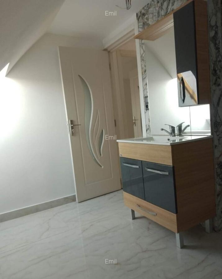 Casa Unirea formata din doua apartamente,cu doua intrari separate. - 17