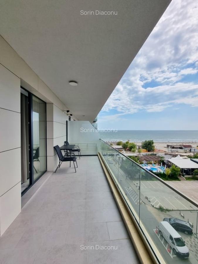 Vedere laterala, pozitie frontala - apartament la 2 pasi de mare. - 10