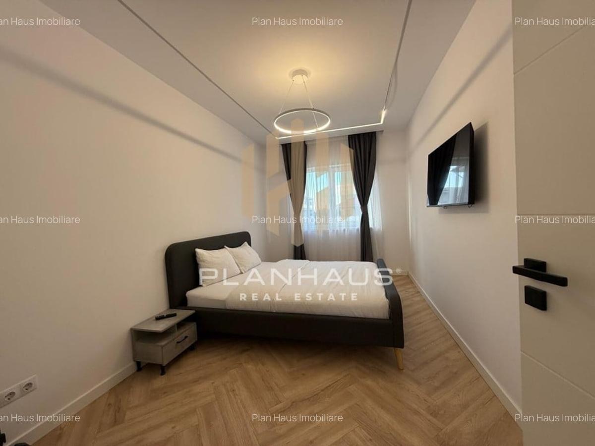 Inchiriere-ultramodern apartament zona rezidentiala ,3 camere,etaj 1,loc de parc - 3