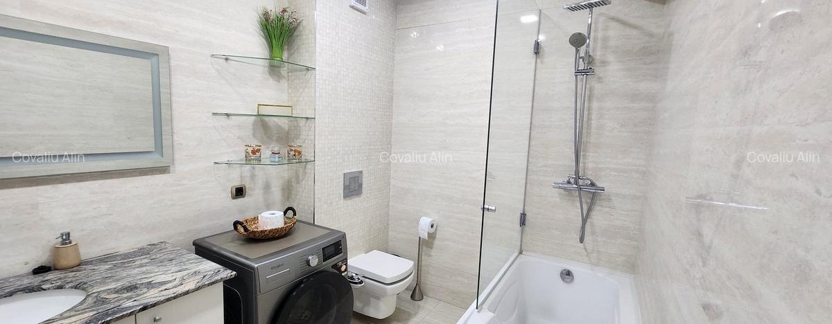 Apartament 2 camere, 2 grupuri sanitare, loc parcare, situat in Tractorul - 18