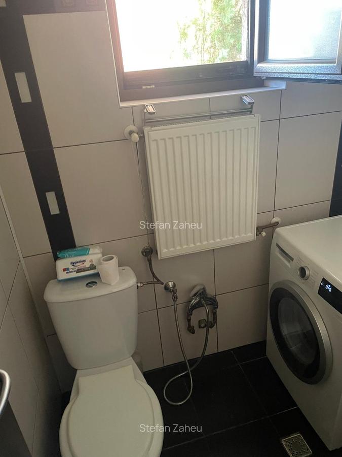 Locuință elegantă cu curte amenajată – parter + etaj, în spatele Pieței Delfinul - 18