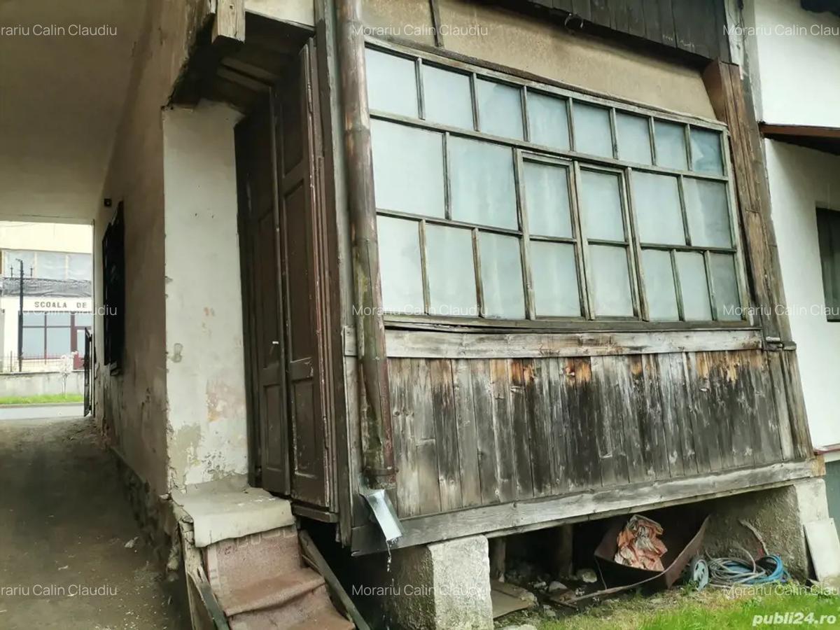 Casa cu 2 camere,bucatarie,magazie,teren 96m2,pt spatii comercial birouri,in zona centrala la strada - 10