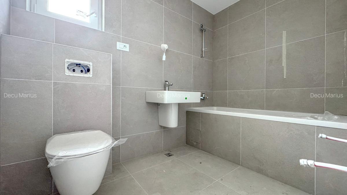 Apartament cu 3 camere decomandat în Tractorul - 15