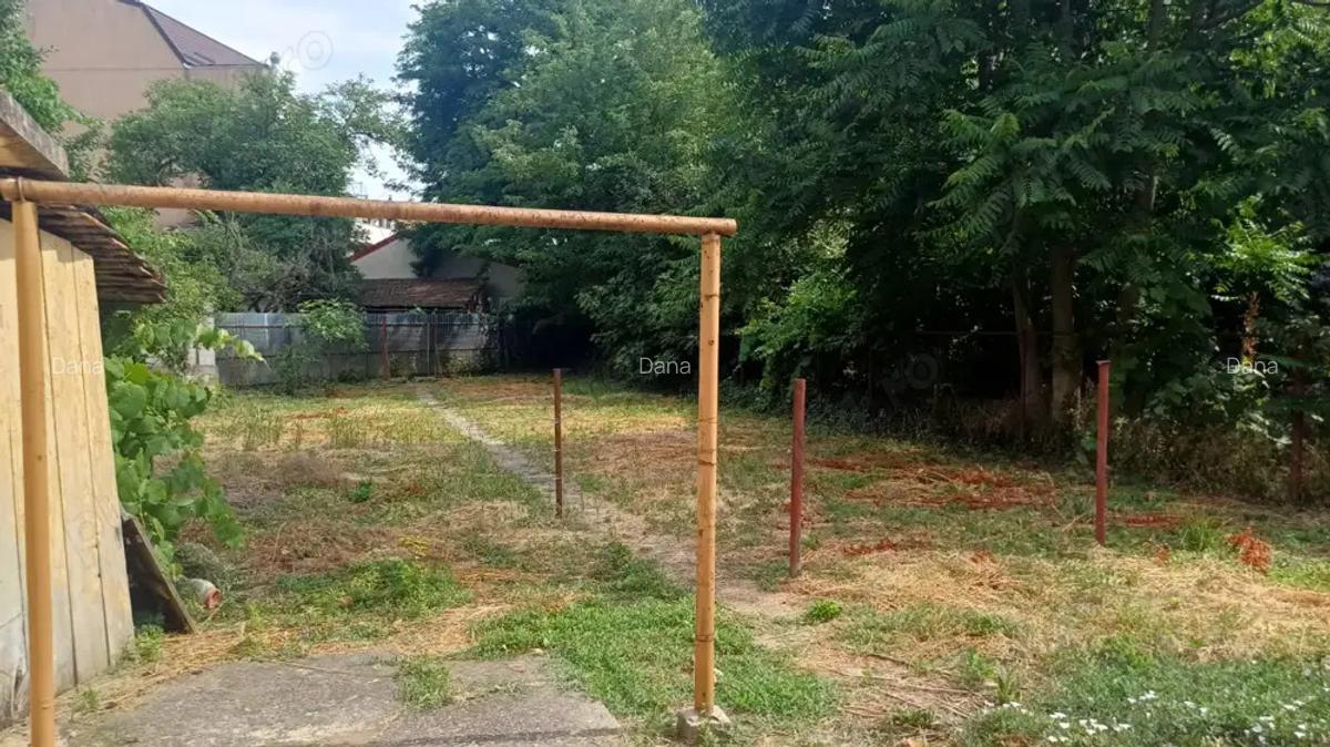 Casa individuala pe parter - 124 mp, 4 camere, anexe si garaj, teren 614 mp, -Str.Dr.I.Muresan - 2