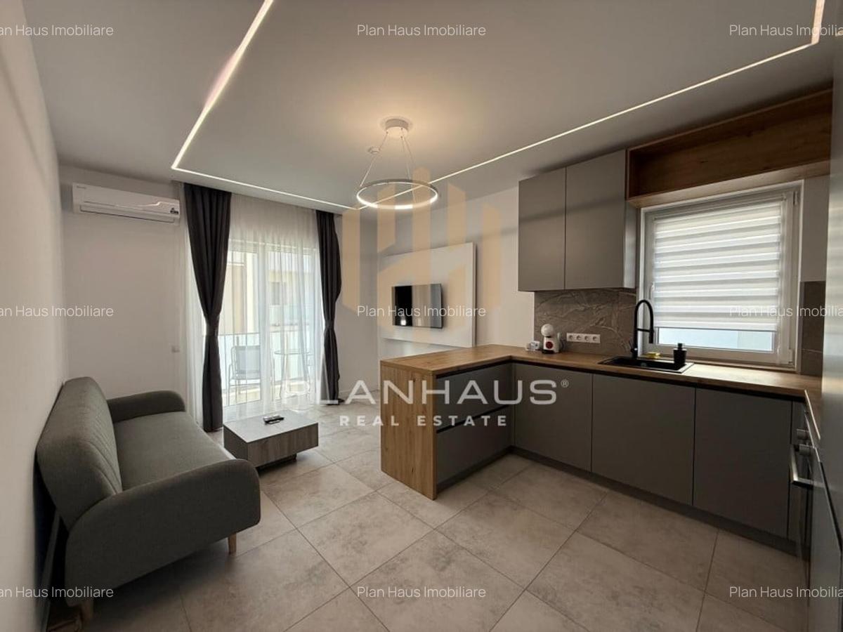 Inchiriere-ultramodern apartament zona rezidentiala ,3 camere,etaj 1,loc de parc - 14
