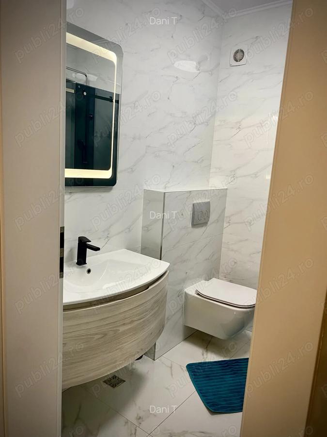 Apartament modern de vanzare 3 camere, 2 terase, garaj subteran - 2 Apartament modern de vanzare 3 camere, 2 terase, garaj subteran - 2