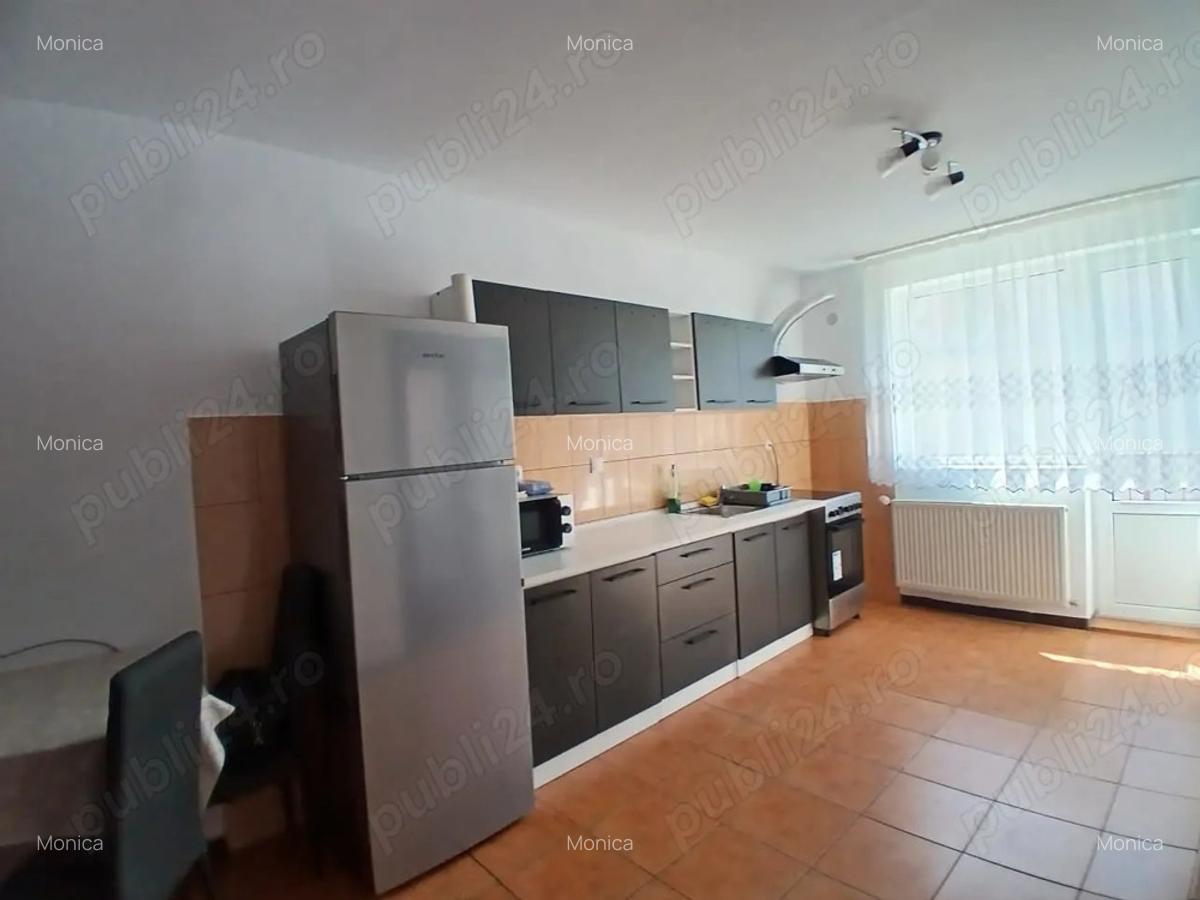 Locuin?a spa?ioasa, situata intr-o zona buna,cu camere luminoase ?i separate,complet mobilata. - 2