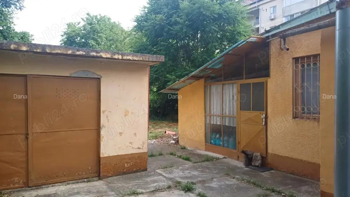 Casa individuala pe parter - 124 mp, 4 camere, anexe si garaj, teren 614 mp, -Str.Dr.I.Muresan - 5