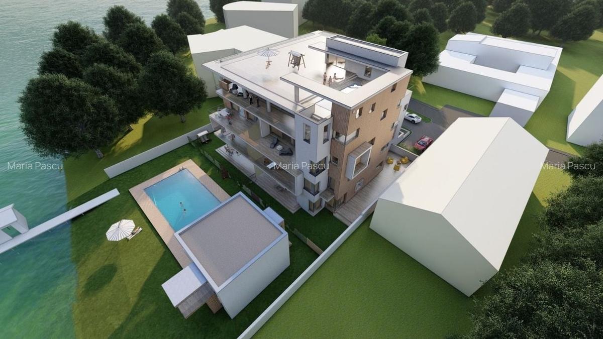 TEREN INTRAVILAN PE MALUL LACULUI, CU AUTORIZATIE - 1