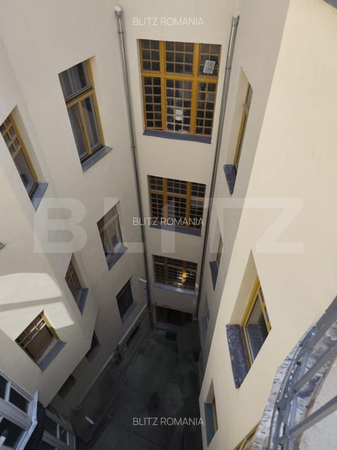 Apartament renovat complet situat in zona ultracentrala in cladire istorica - 12