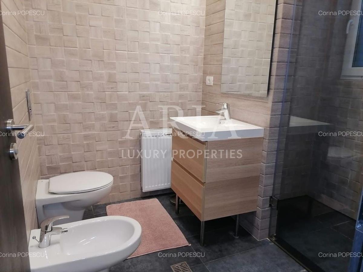 Apartament cu 5 camere decomandat, mobilat în Băneasa - 12