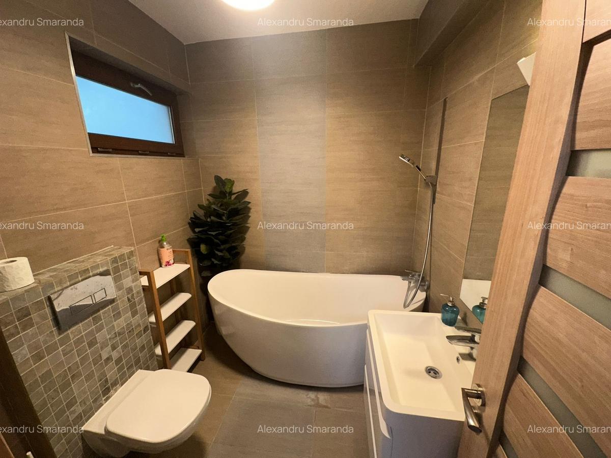 Casă cu 4 camere în Tunari - 9