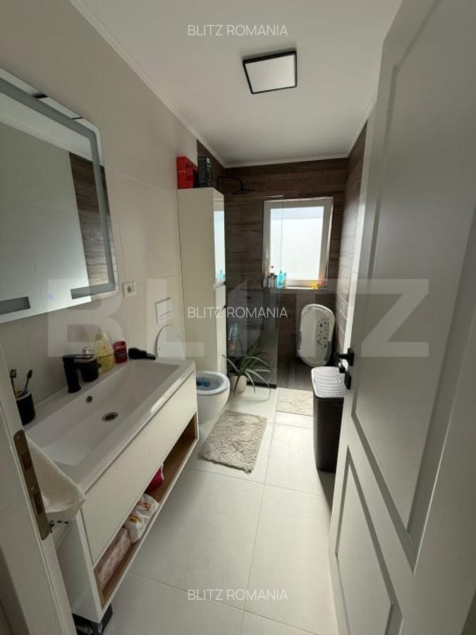 Apartament cu 3 camere, 65 mp si un foisor cu gradina de 191 mp - 9