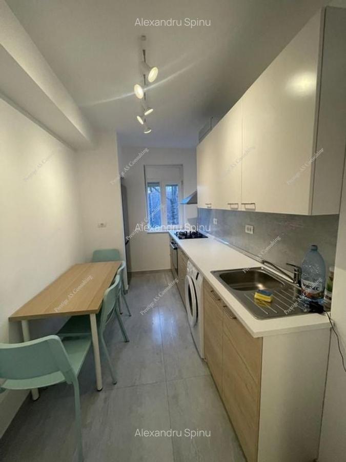 Apartament de vanzare cu 2 camere, renovat complet, cu boxa prorie - Complex - 4