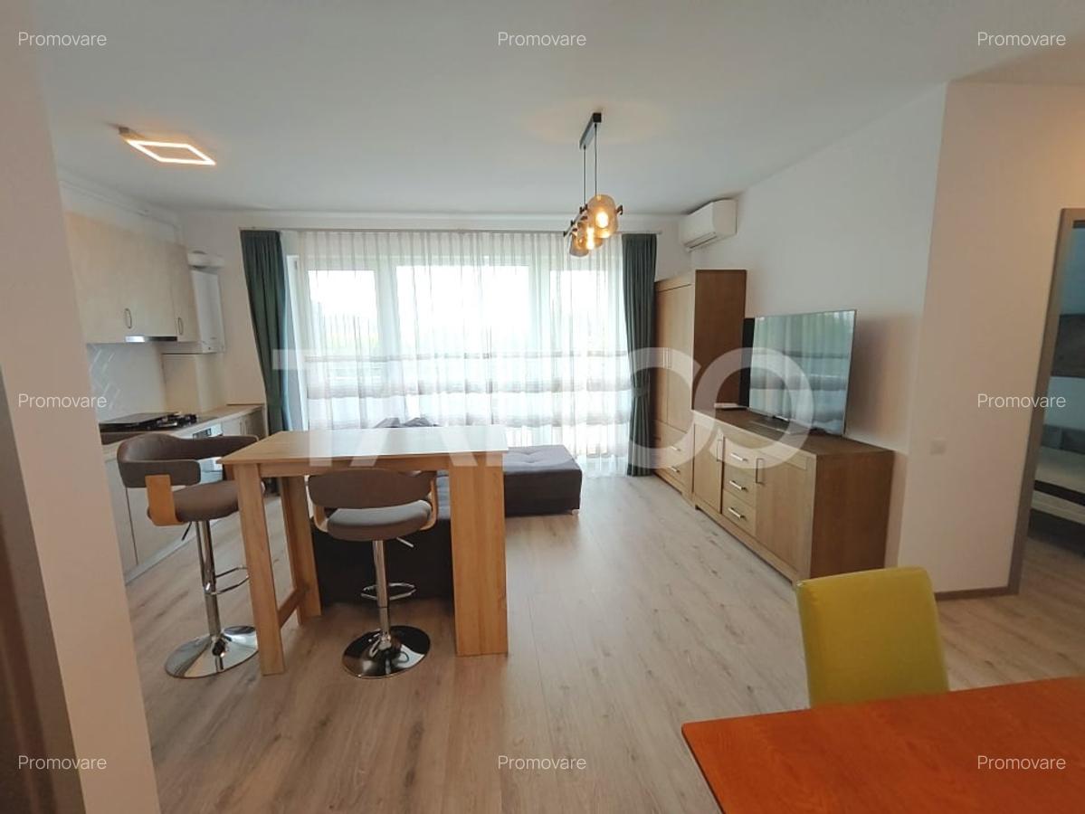 Apartament modern 3 camere - terasa - parcare subterana - bloc cu lift - 18